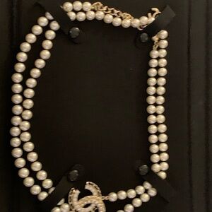 Elegant Pearls long  authentic  Chanel  Necklace with Silver Accents from Paris!